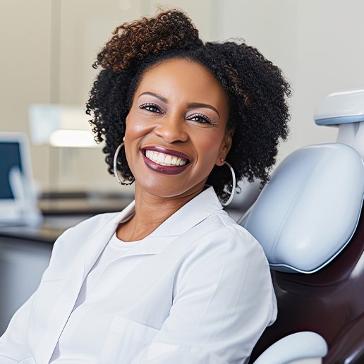 Woman smiling after learning the cost of teeth whitening in Merrillville 